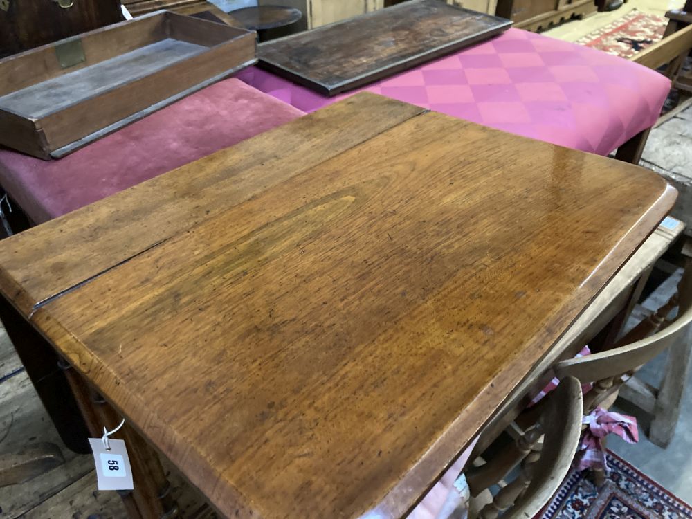 A small late Victorian walnut Sutherland table, width 50cm height 52cm